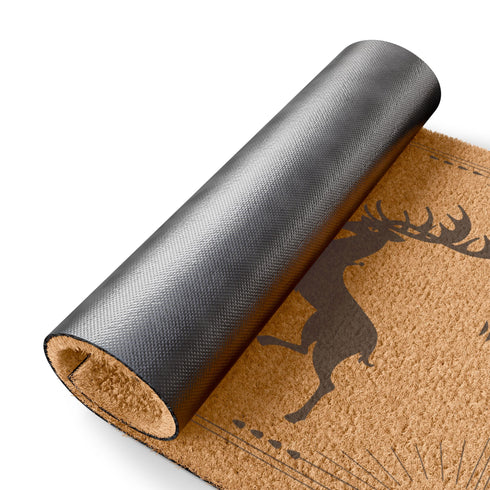 Rectangular coir doormat with two standing stags, triple moon symbol, and tree of life design in black on natural tan background.